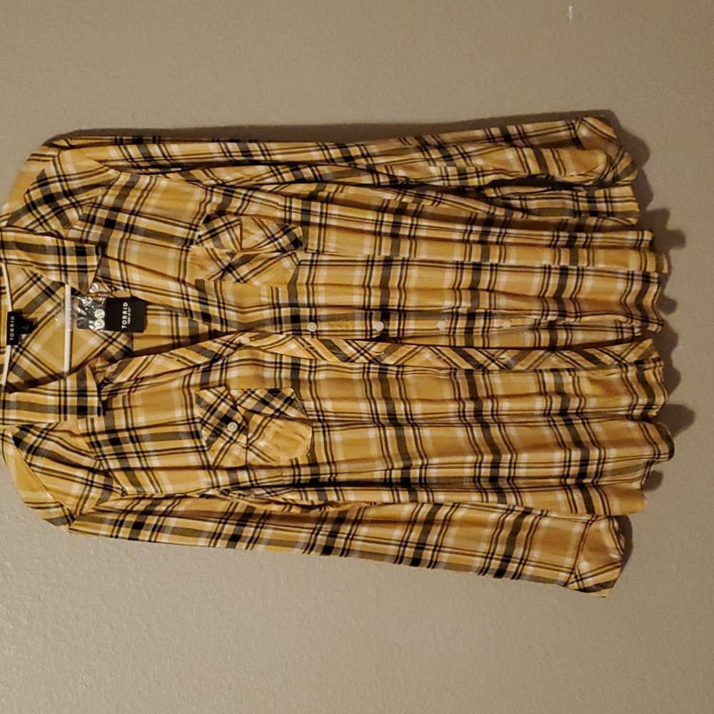 Yellow and Black plaid shirt.